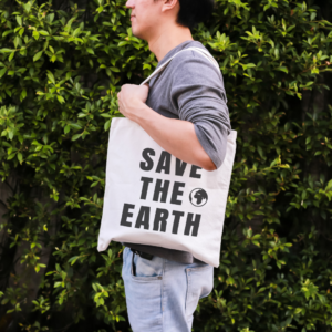 man with save the earth tote bag