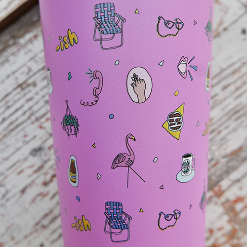 Image of a pink tumbler filled with retro 80's icons.