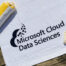 Image of white beach towel with Microsoft Cloud Data Sciences logo