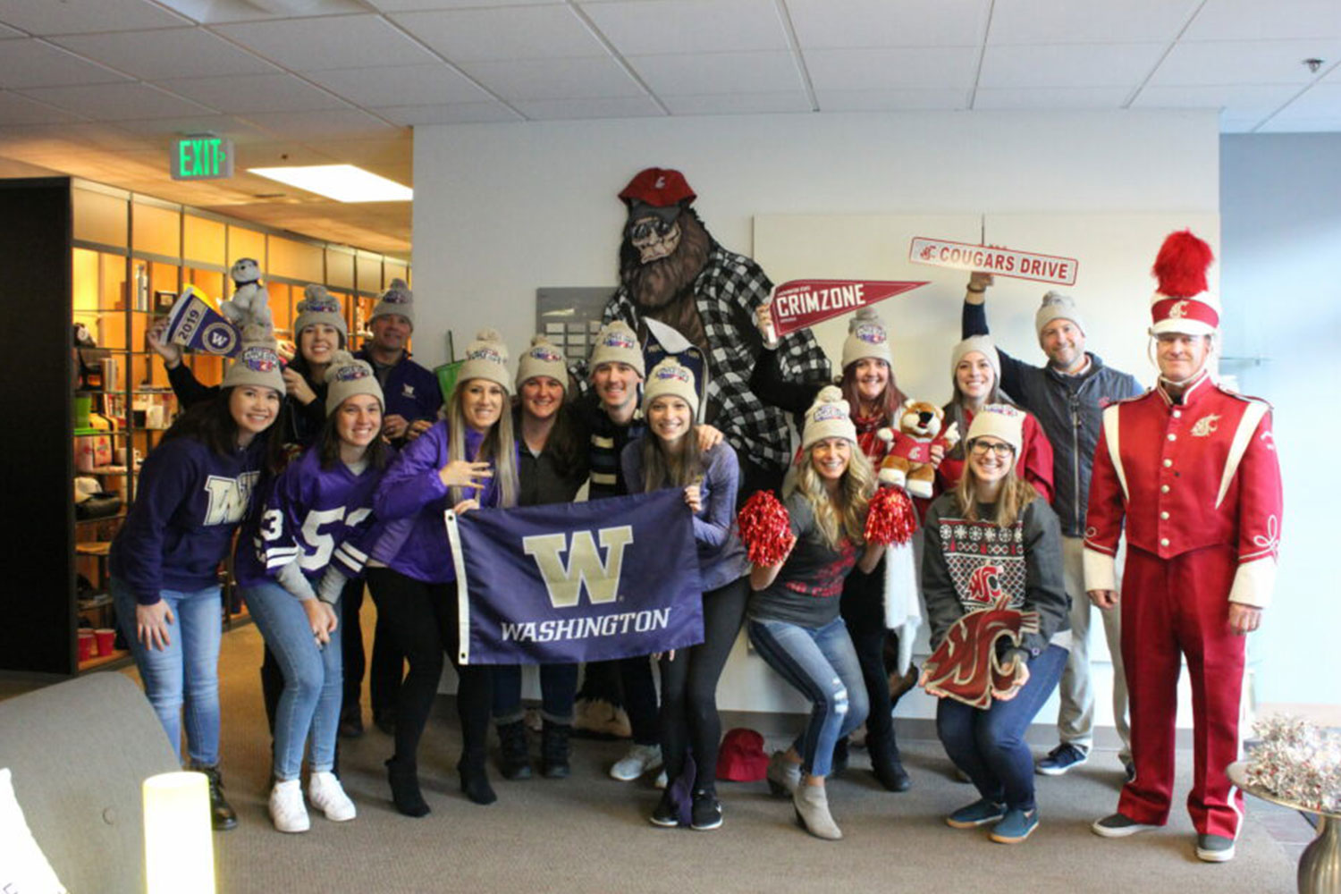 Group of Image Source employees dressed up in college colors.