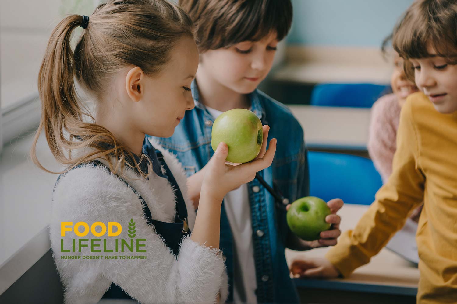 Food Lifeline logo over image of children eating apples.