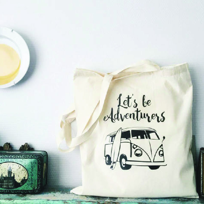 Tote bags that says: Let's be adventurers.
