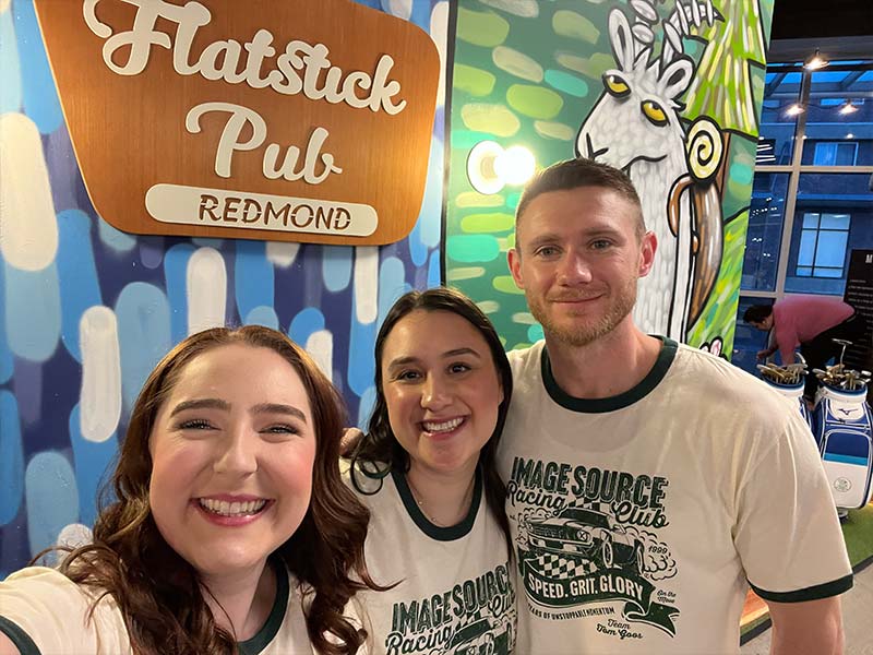 Three people at Flatstick Pub